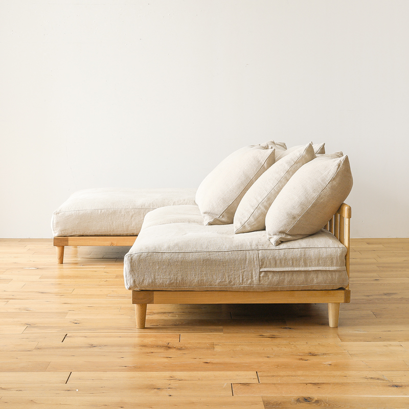 L shaped sofa in teak wood with cotton canvas cushions