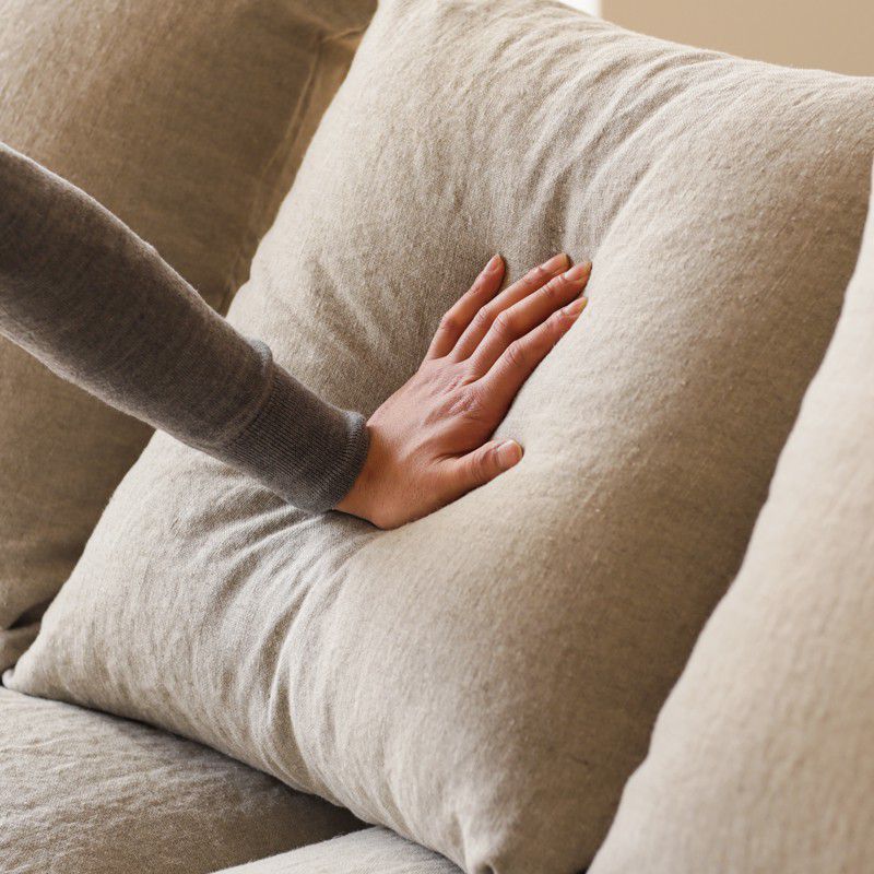 L shaped sofa in teak wood with cotton canvas cushions