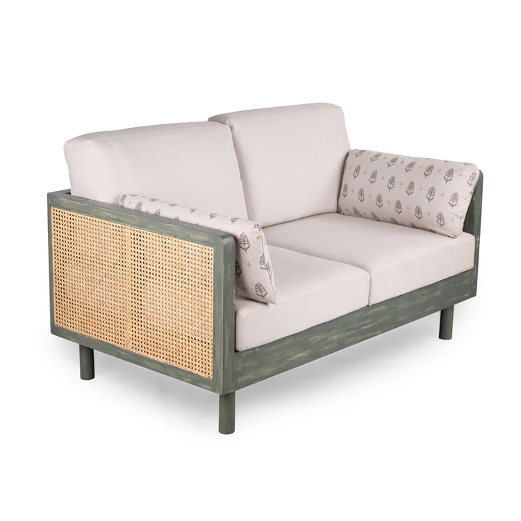 Wood 2 seater sofa with rattan cane work in distress green finish