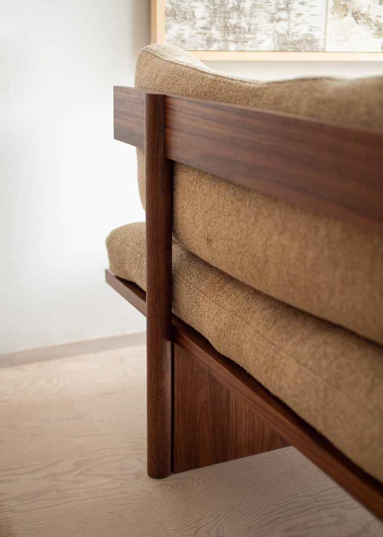 Orion armless teak sofa 3 seater with natural brown finish