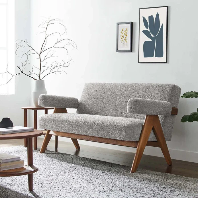 Wooden loveseat in solid teak wood with natural brown finish Wooden loveseat in solid teak wood with natural brown finish