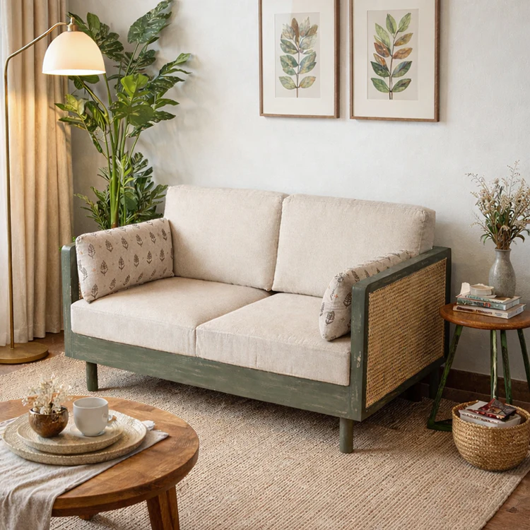 Wood 2 seater sofa with rattan cane work in distress green finish