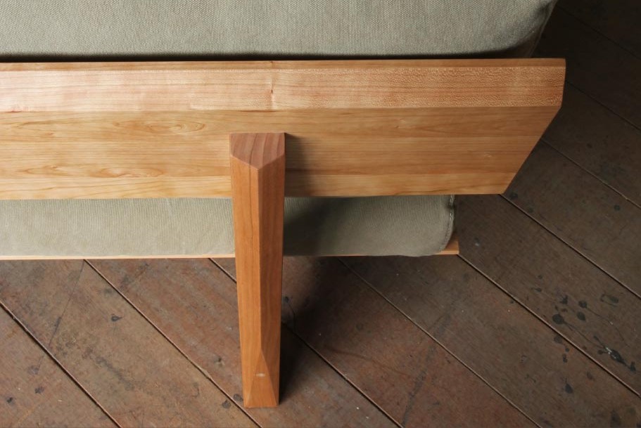 Arlo compact L shape sofa in teak wood with custom cushions