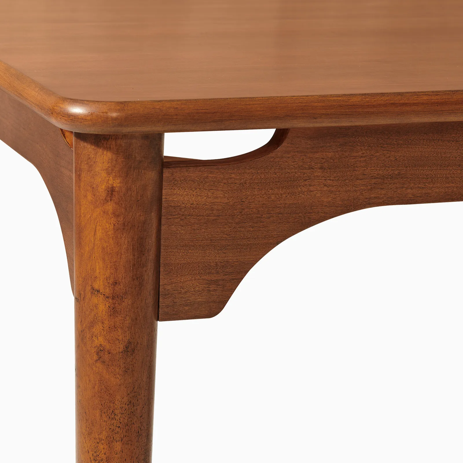 Corvane dining table in teak wood with natural brown finish