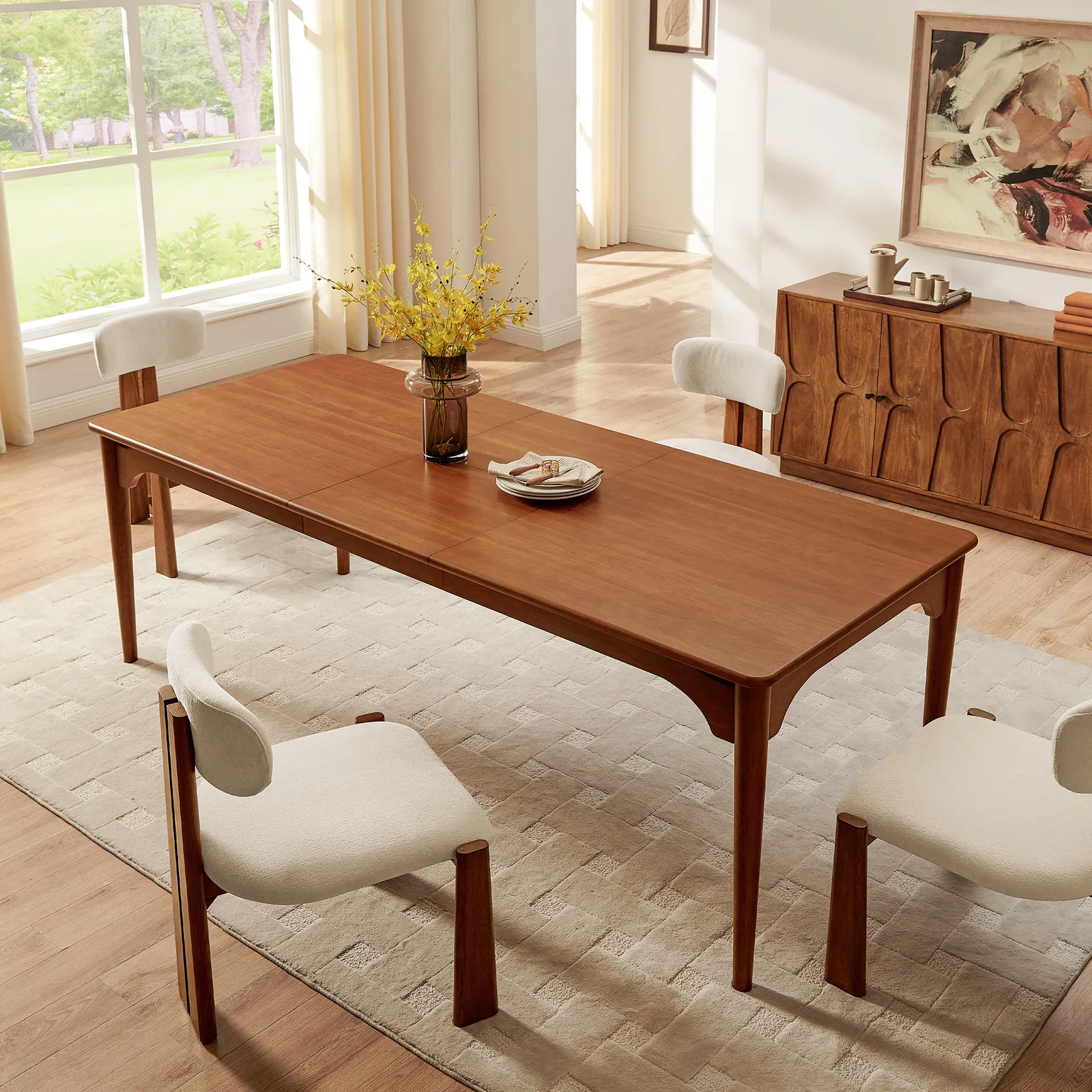 Corvane dining table in teak wood with natural brown finish