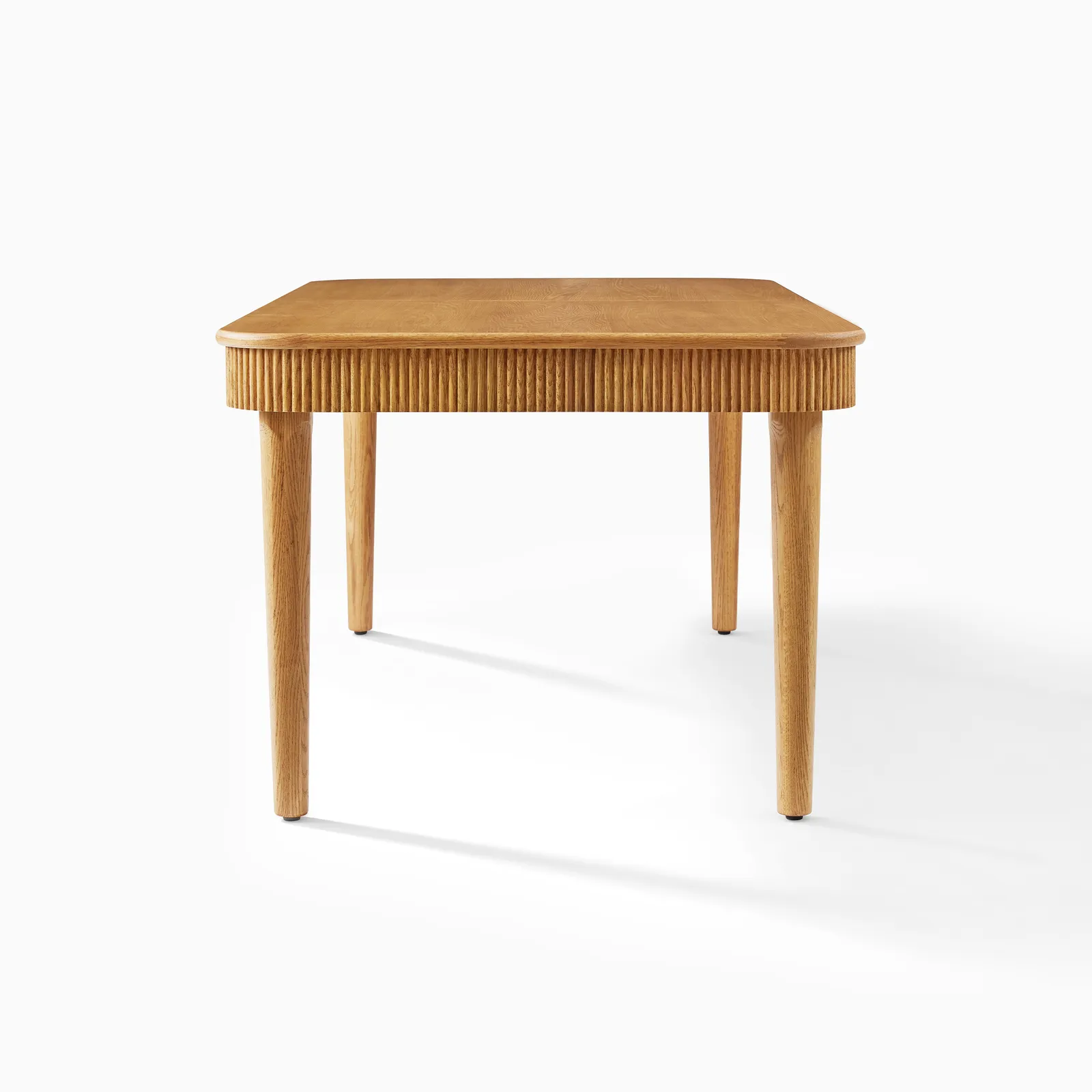 Classic dining table in teak wood with natural finish