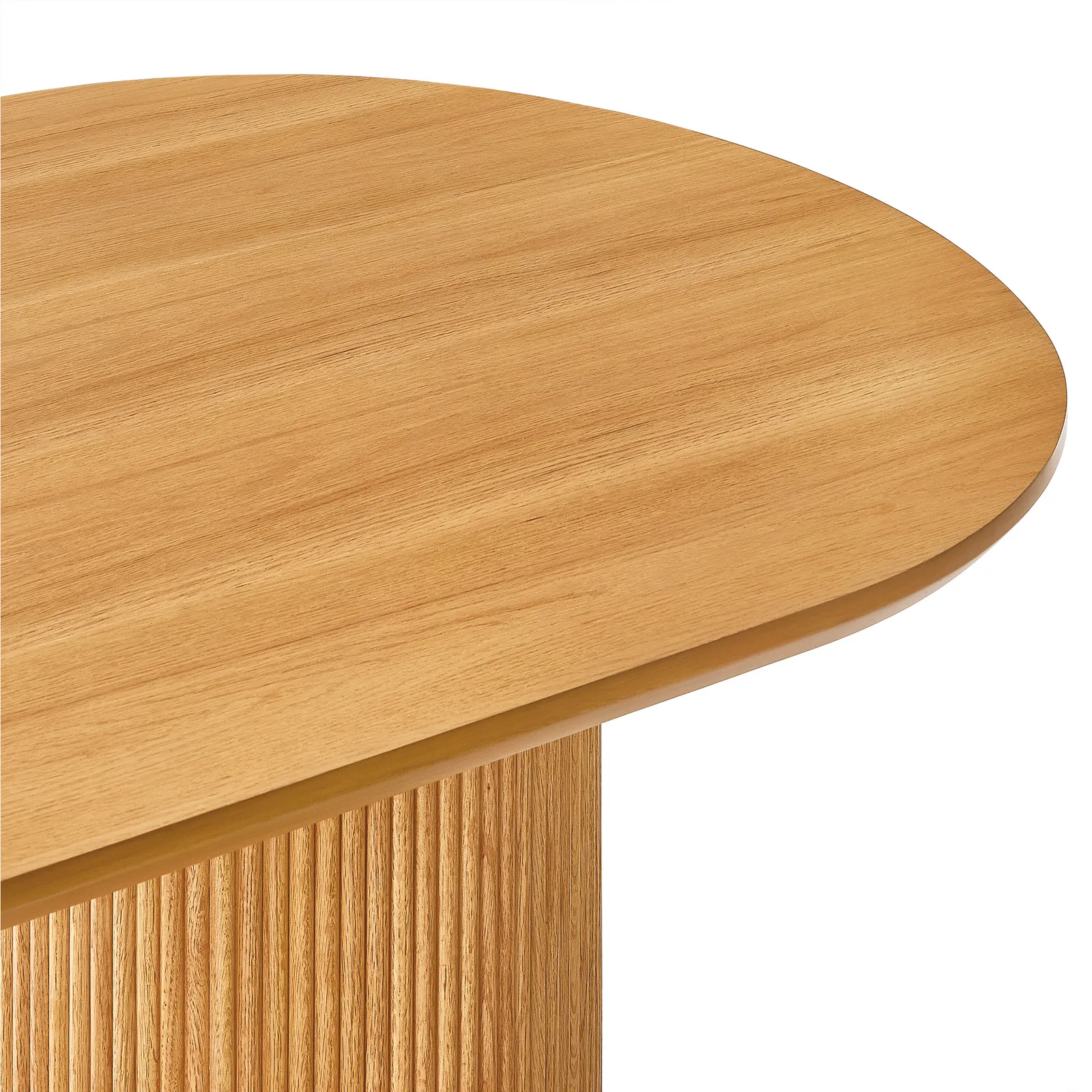 Curved dining table in teak wood with natural finish