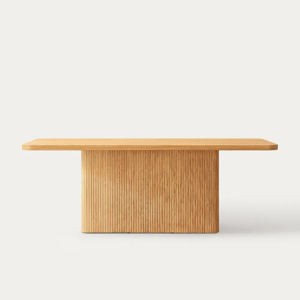 Premium dining table in teak wood with natural finish Premium dining table in teak wood with natural finish