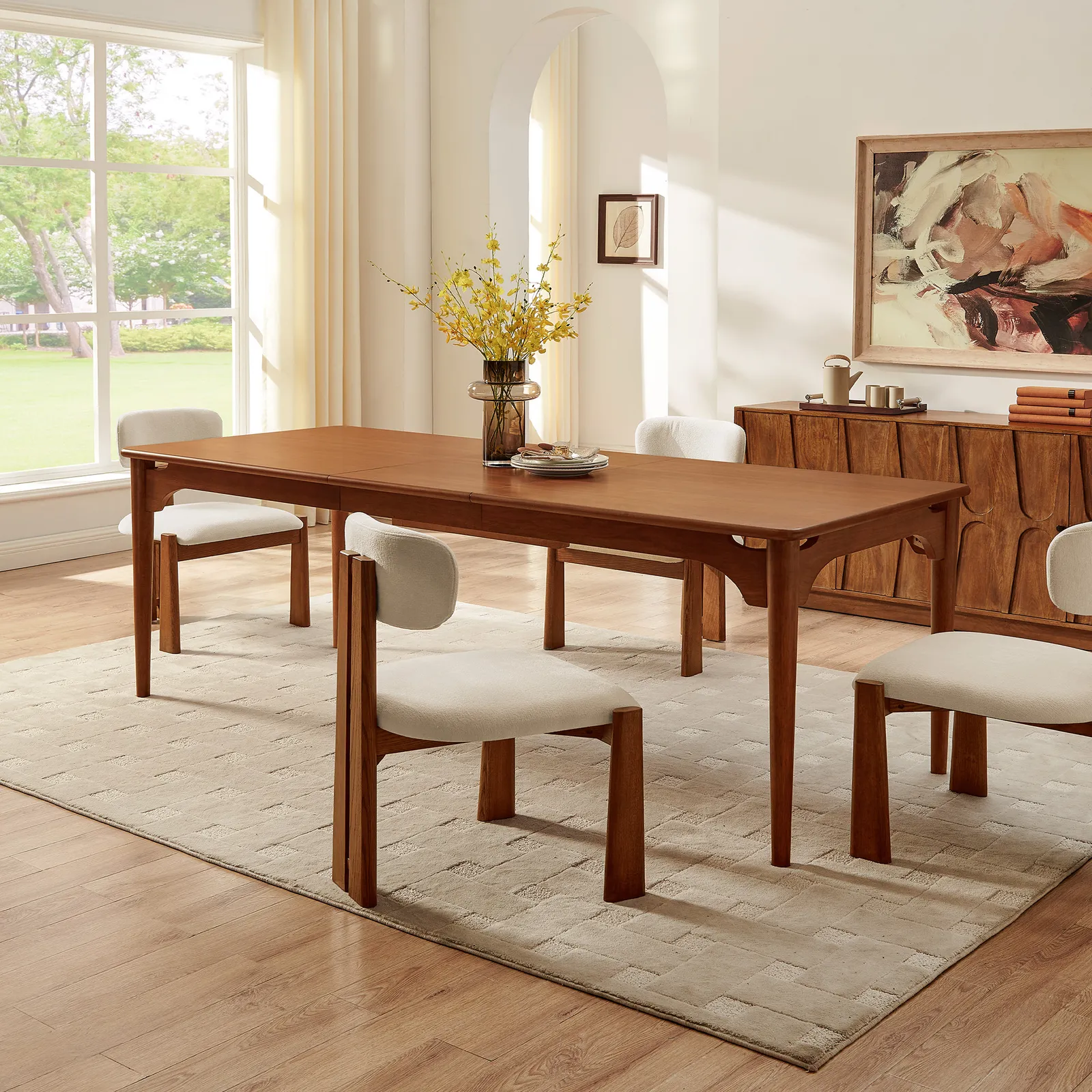 Corvane dining table in teak wood with natural brown finish