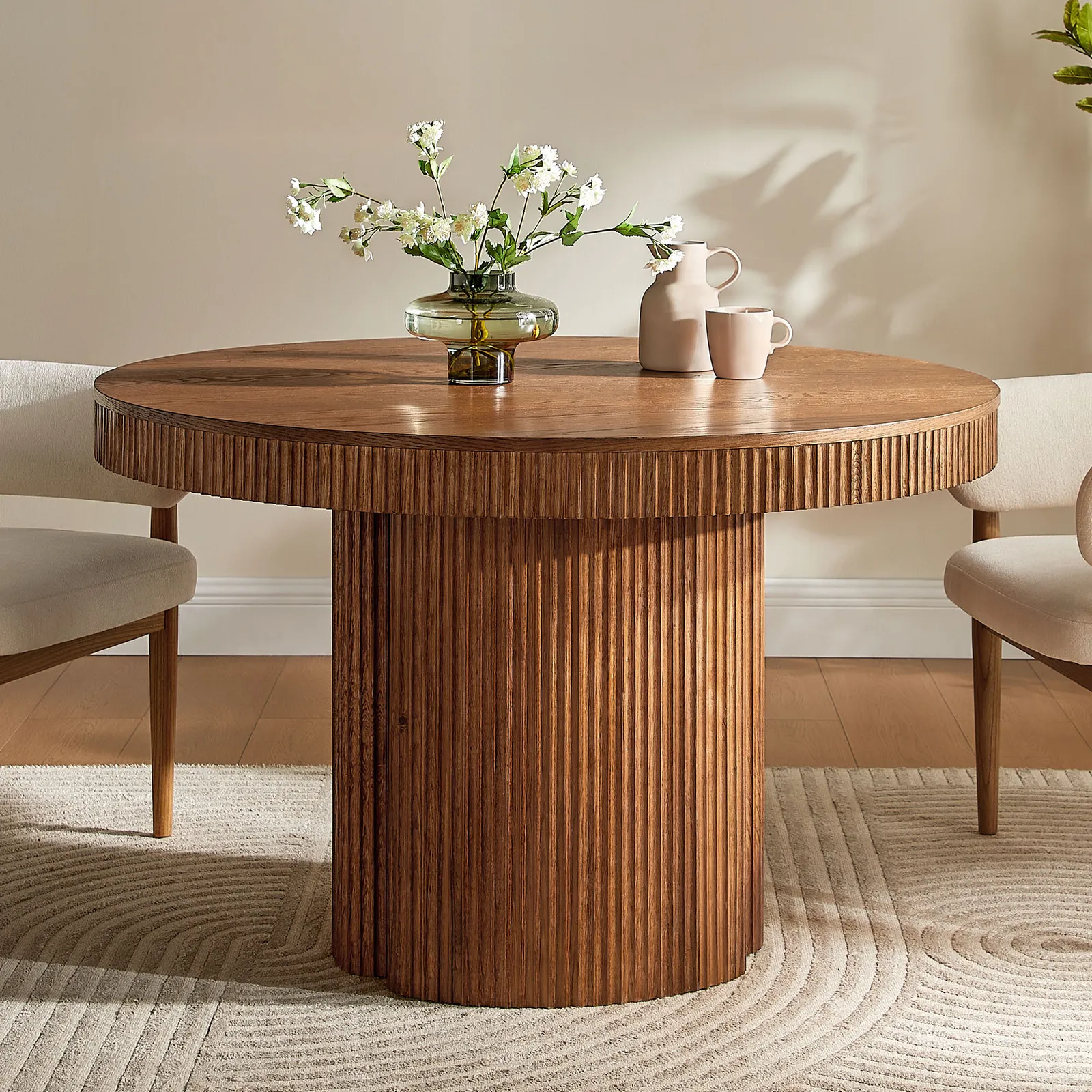 Teak wood dining table in natural brown finish