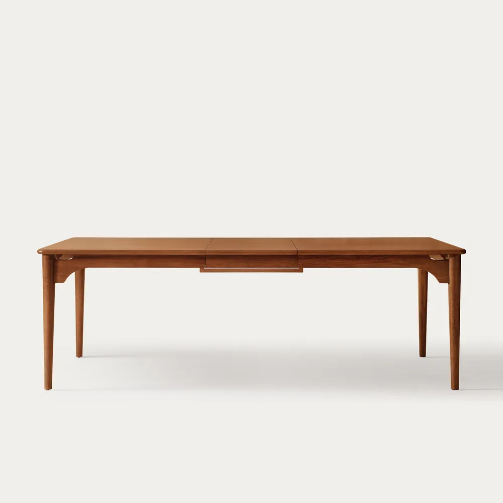 Corvane dining table in teak wood with natural brown finish
