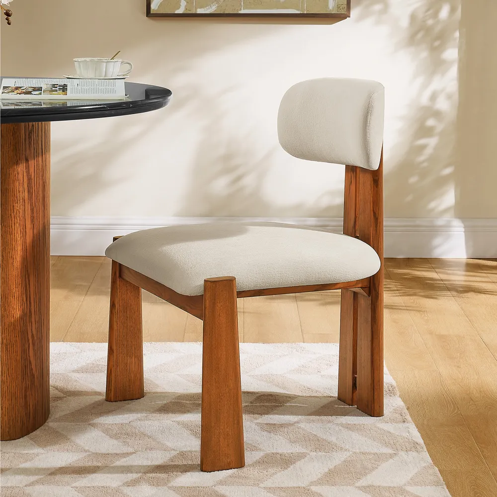 Kiri dining chair in teak wood with soft cushions Kiri dining chair in teak wood with soft cushions