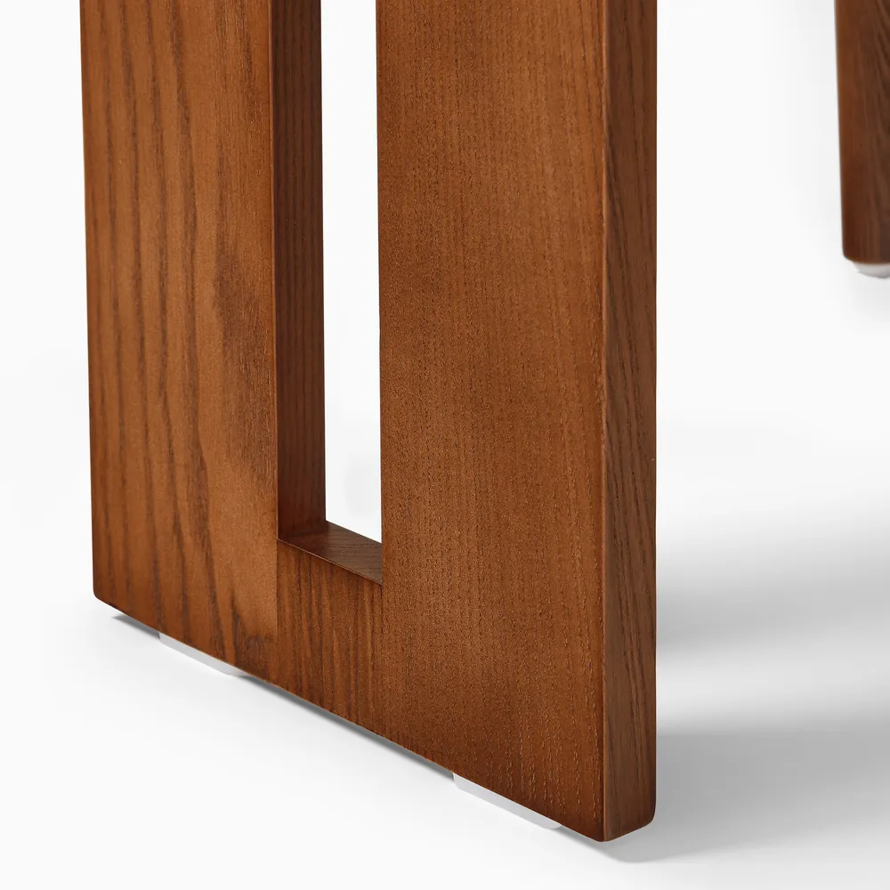 Sway dining chair in teak wood with natural brown finish