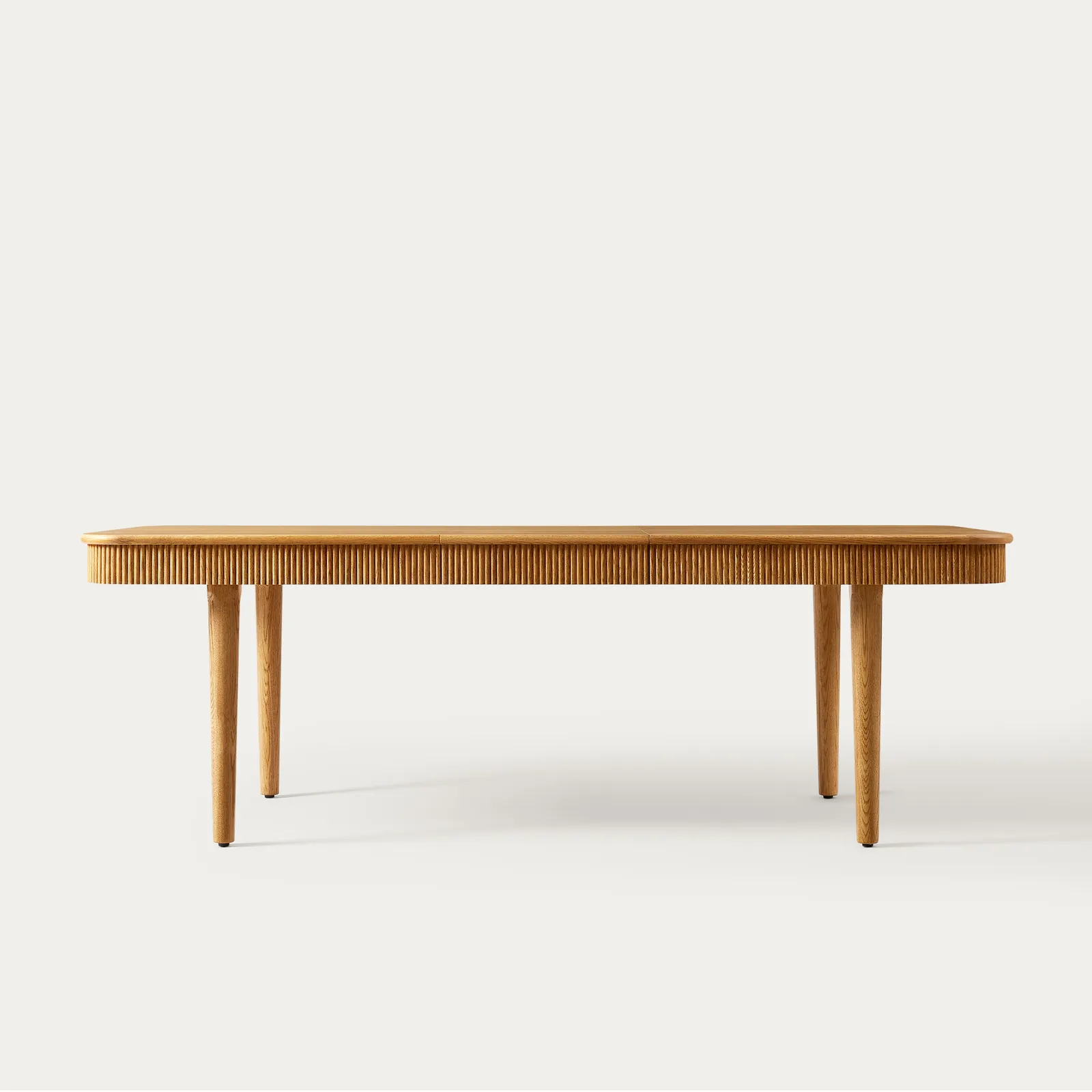 Classic dining table in teak wood with natural finish