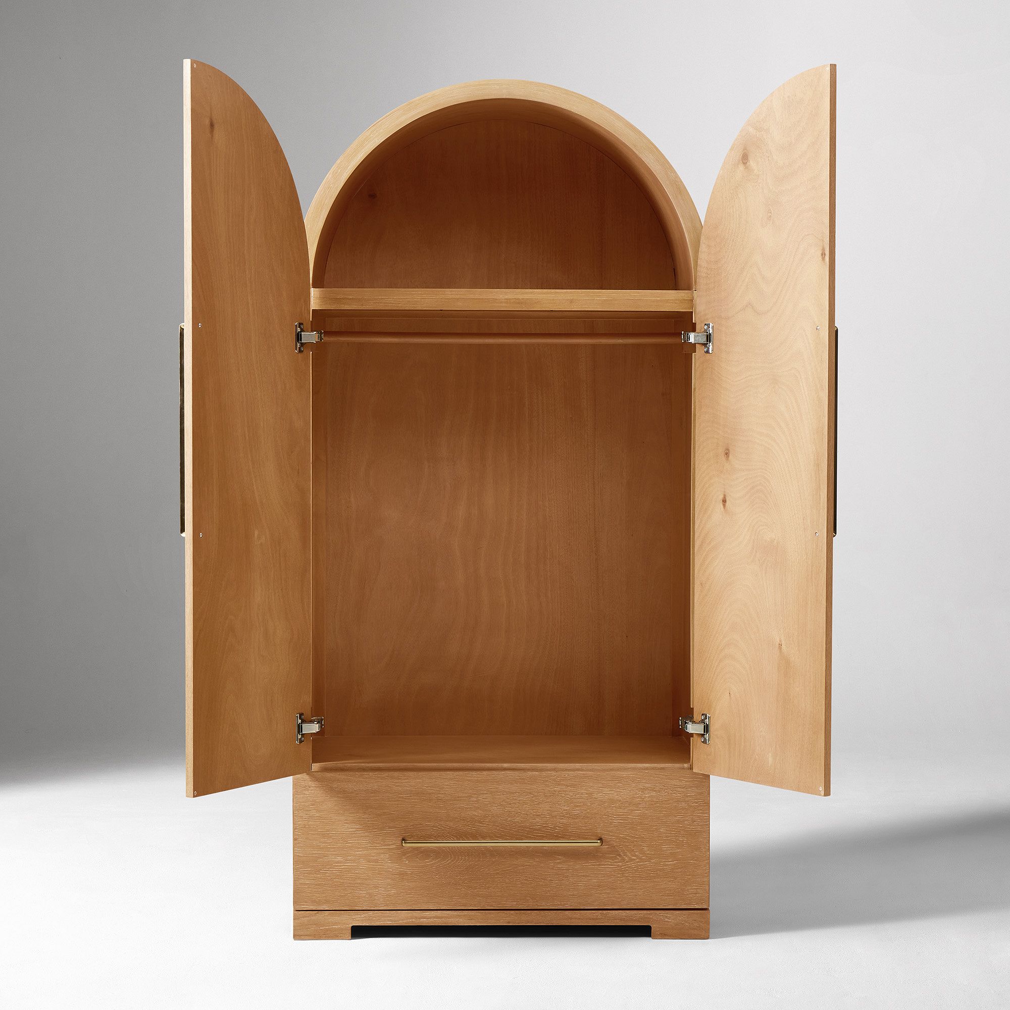 Arched wardrobe in teak wood with natural finish
