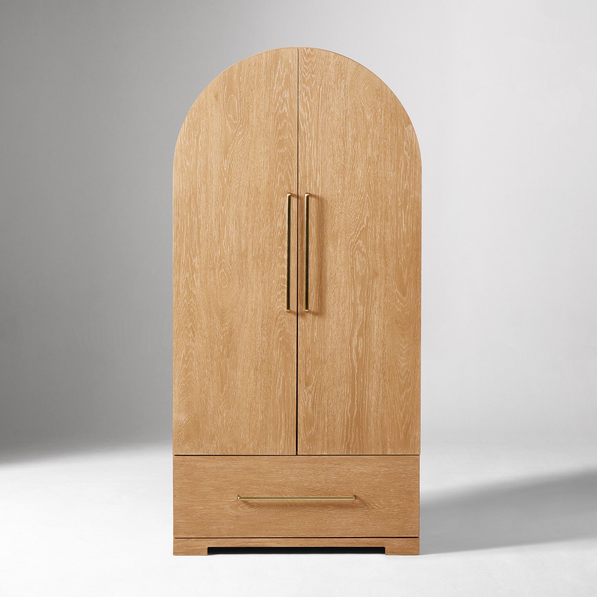 Arched wardrobe in teak wood with natural finish