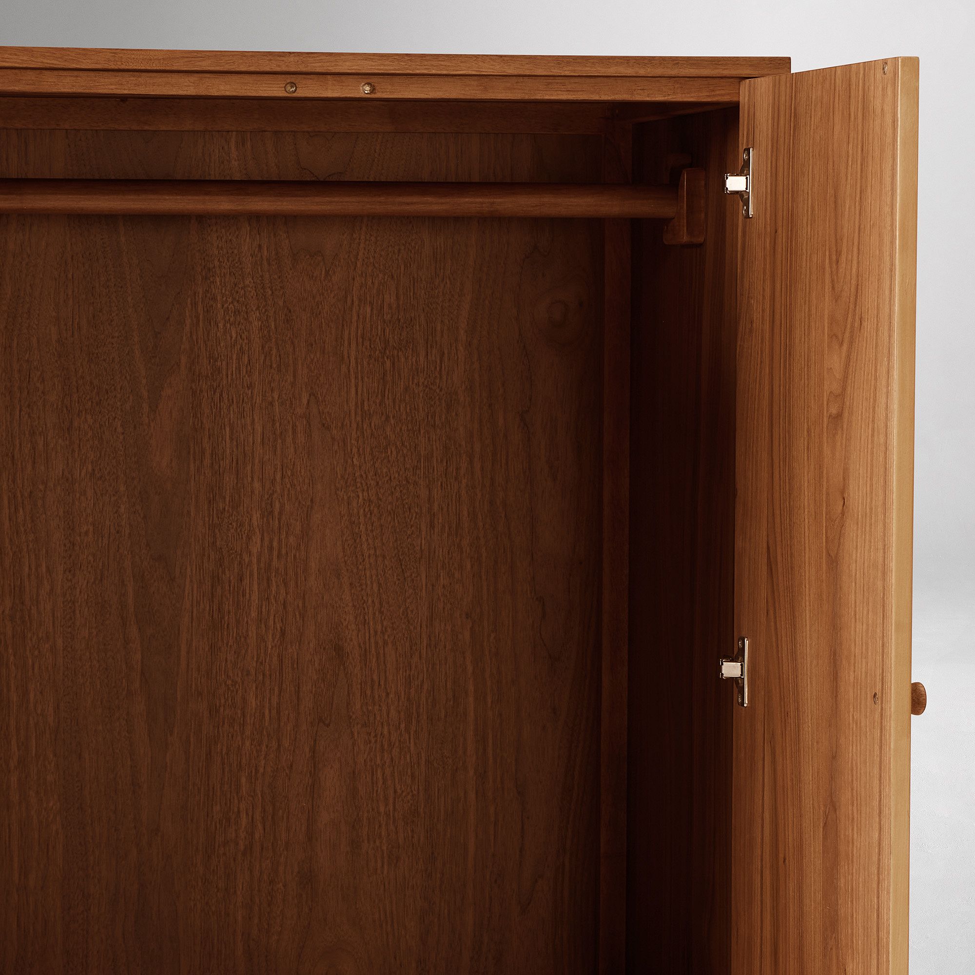 Two-tone wooden wardrobe in teak wood with walnut veneer