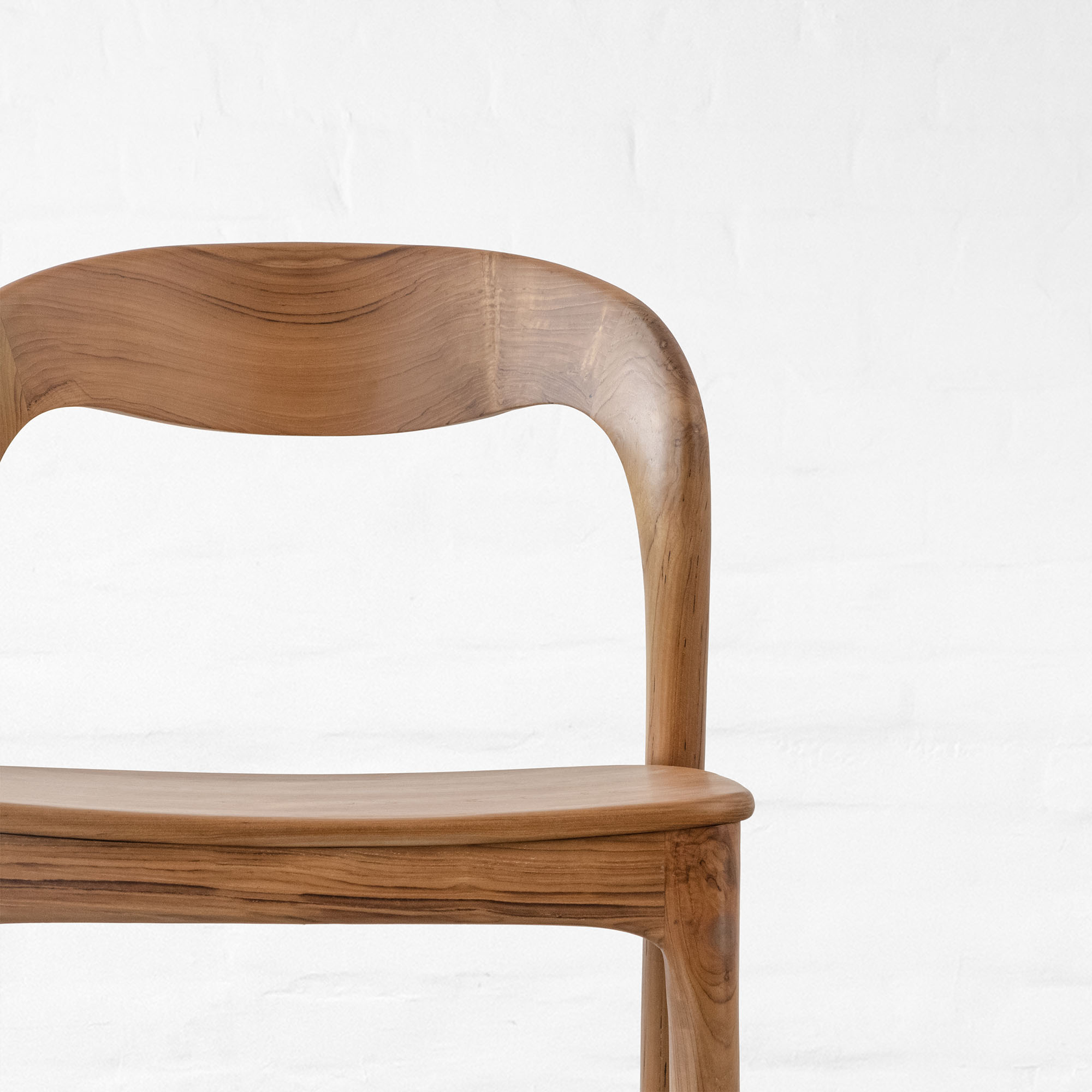 Premium dining table in teak wood with natural finish