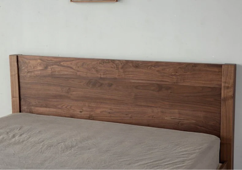 Aero wooden bed in teak wood with natural brown finish Aero wooden bed in teak wood with natural brown finish