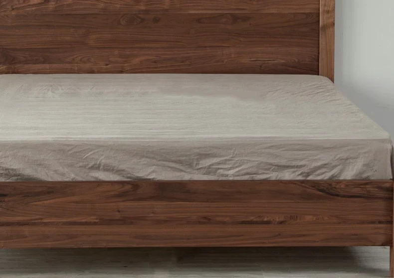 Aero wooden bed in teak wood with natural brown finish Aero wooden bed in teak wood with natural brown finish