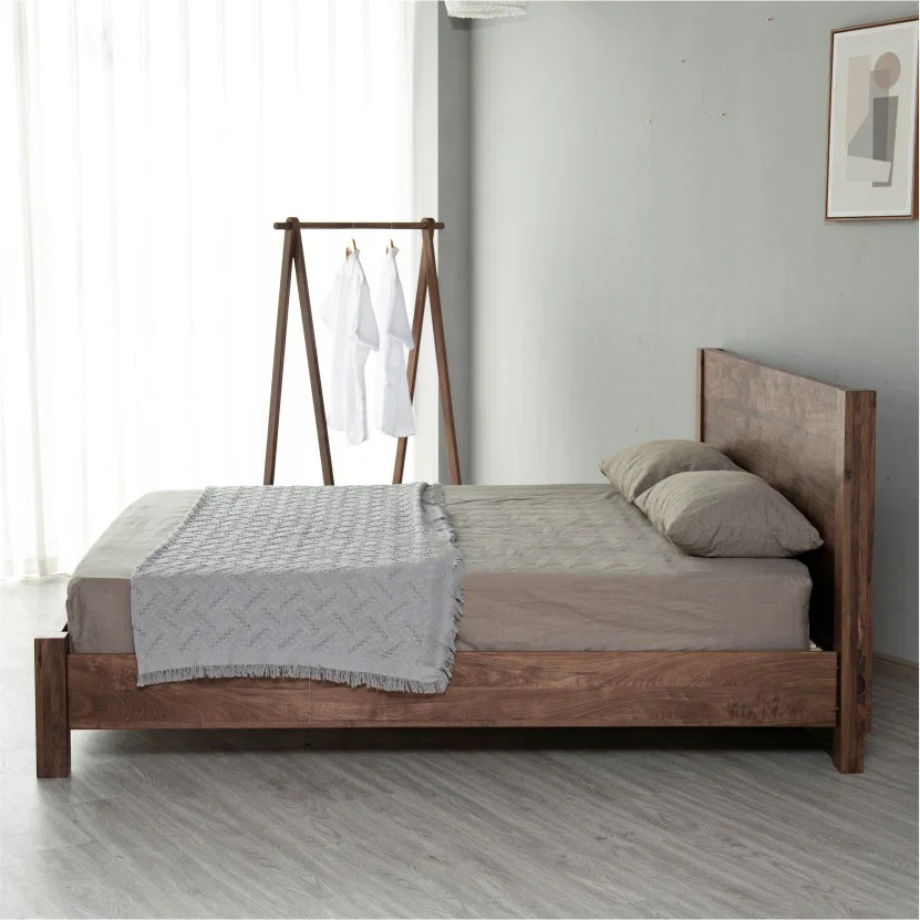 Aero wooden bed in teak wood with natural brown finish Aero wooden bed in teak wood with natural brown finish