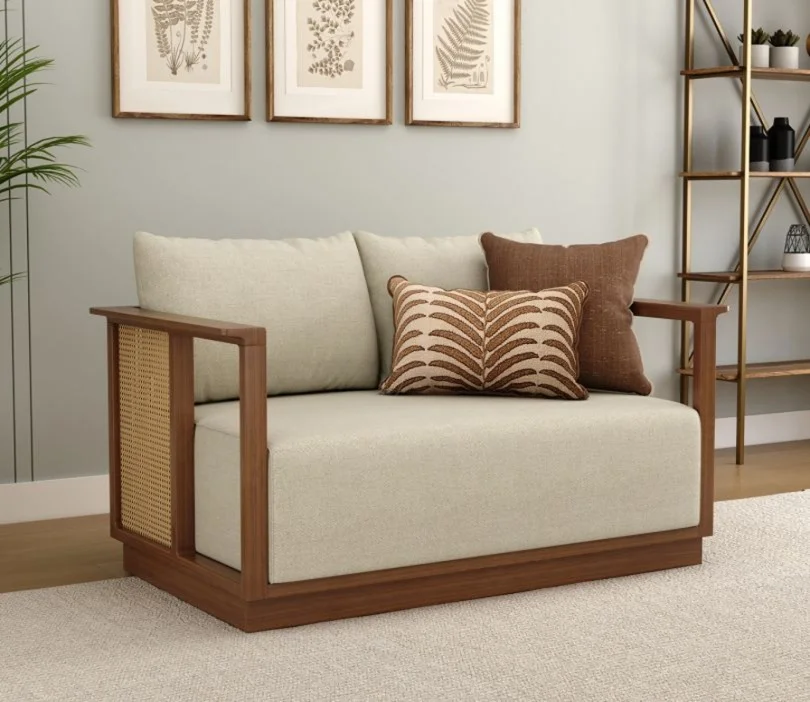 Wooden 2 seater sofa with cane accents in natural brown finish